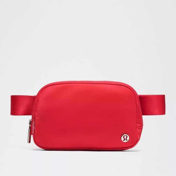 lululemon everywhere belt bag on sale Solid Tuck The Excess Belt Bag Strap Into The Elastic Loops LULULEMON Everywhere Belt Bag LULULEMON